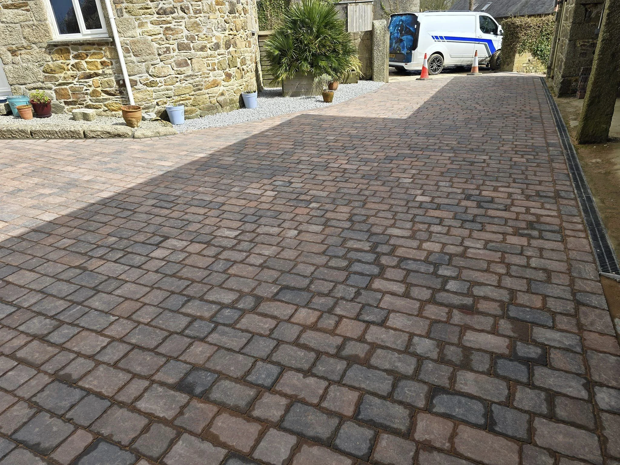 Cobble block driveway at a stone house