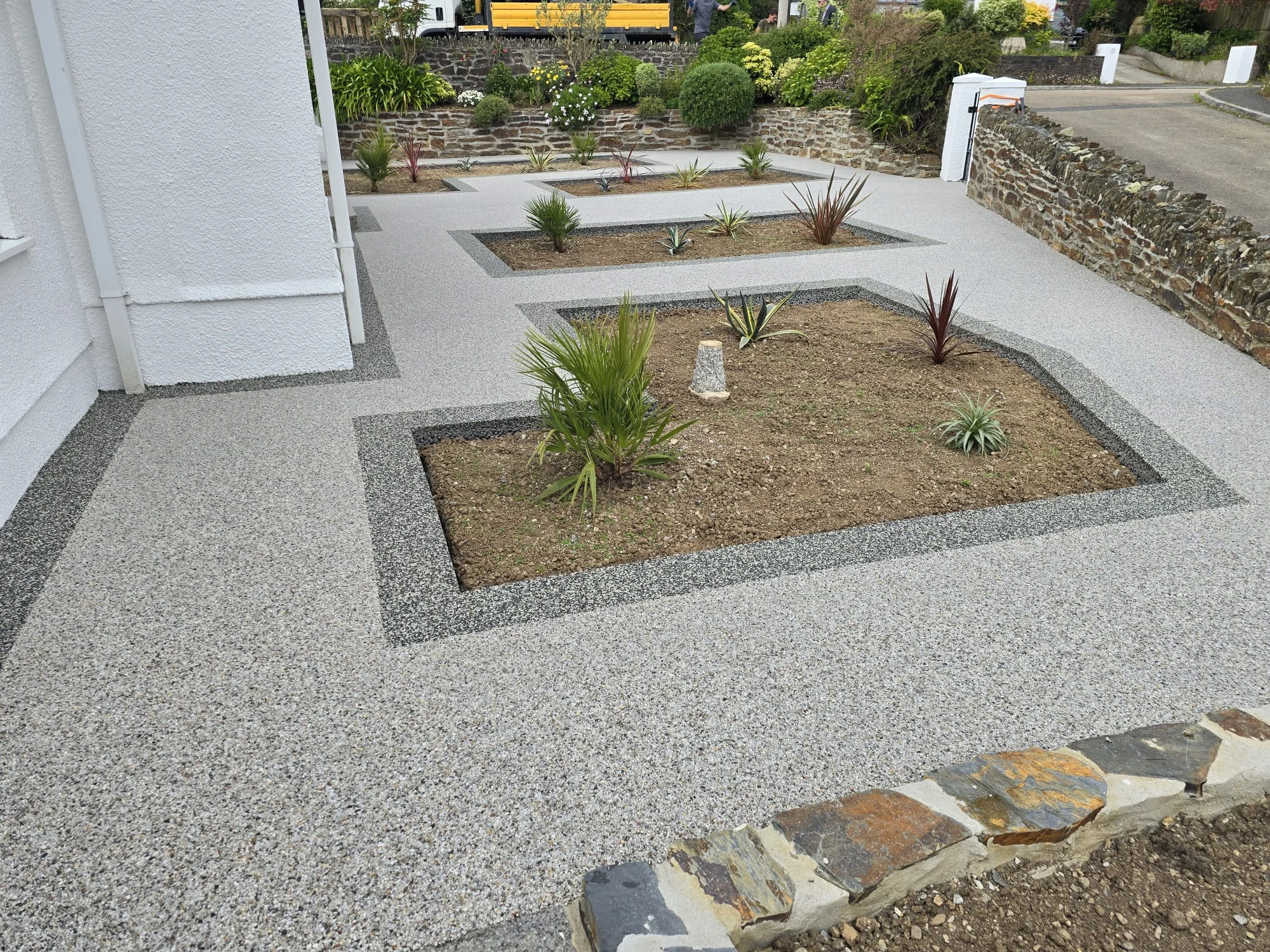 Resin bound front garden around a planting bed