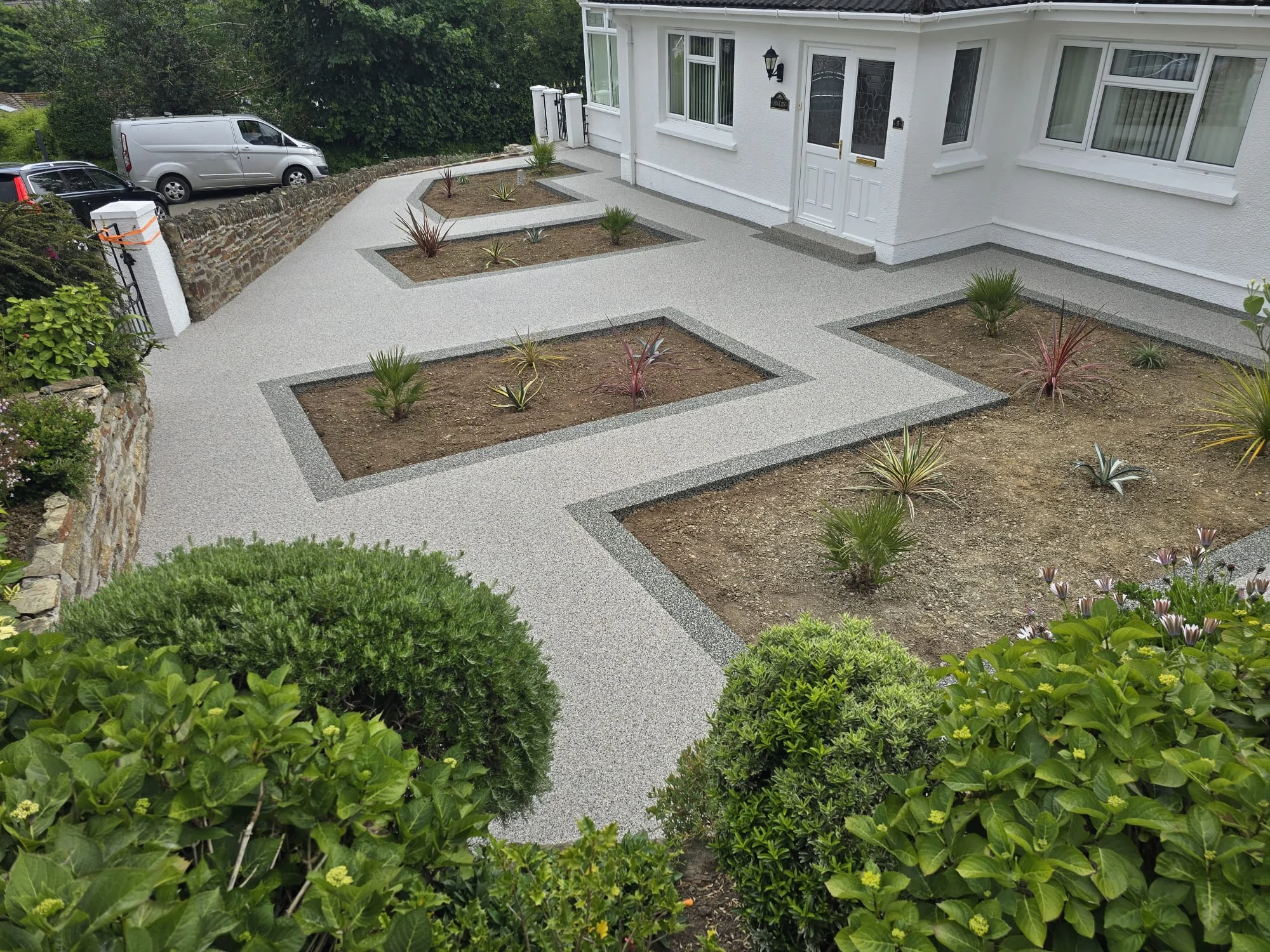 Resin bound front path between planted beds