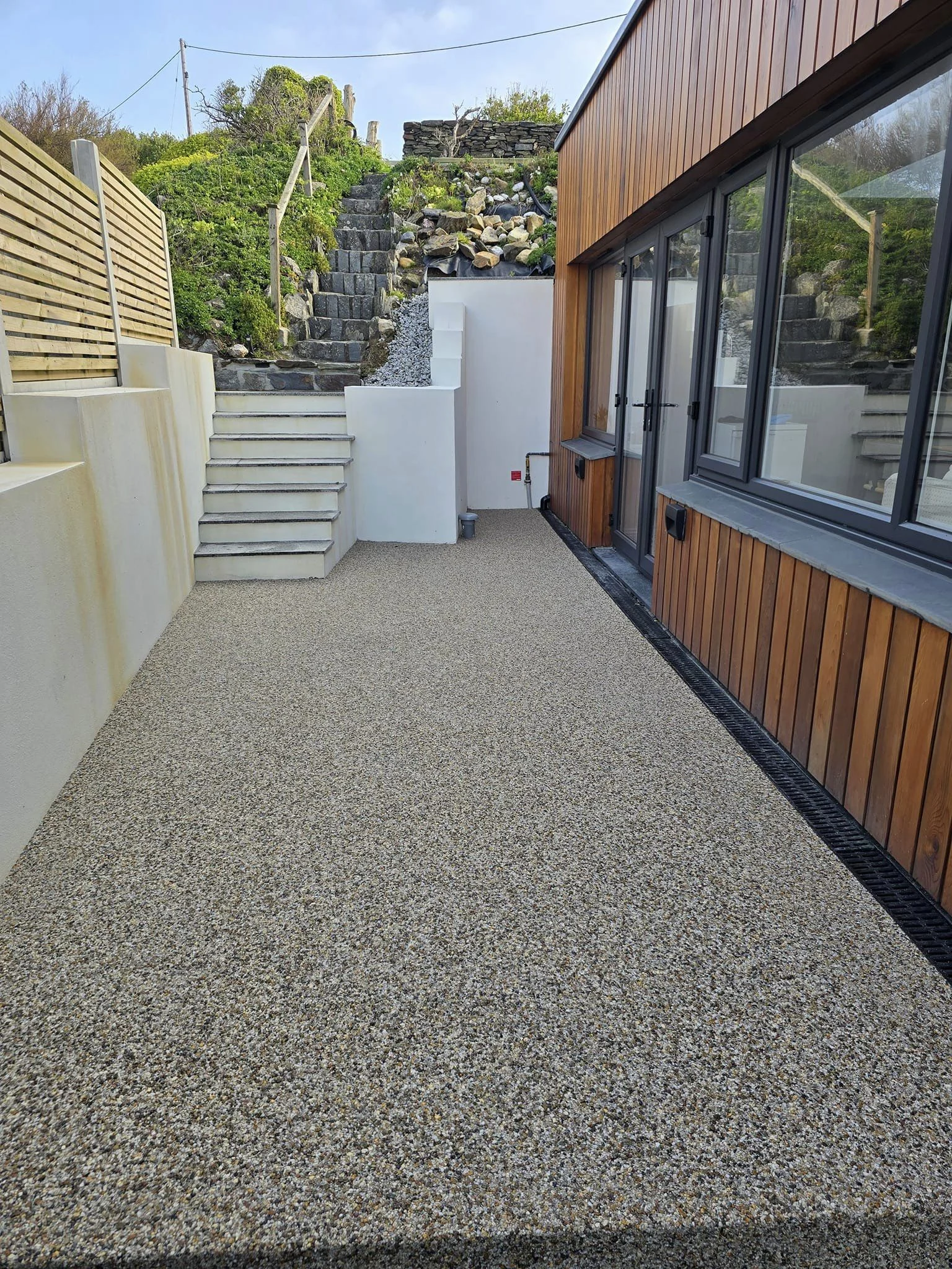 Resin bound path beside a contemporary house