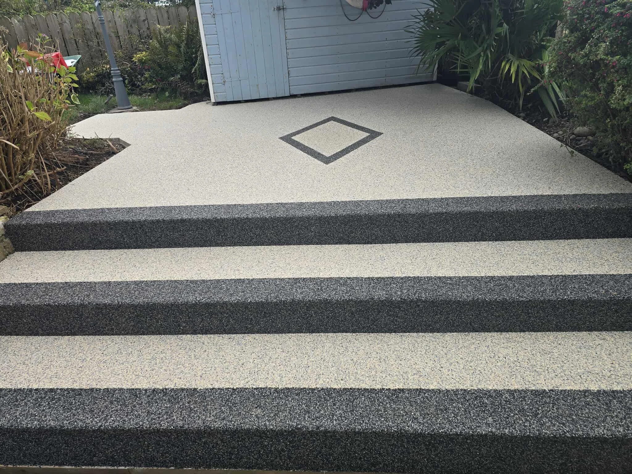 Resin bound steps with a diamond inlay